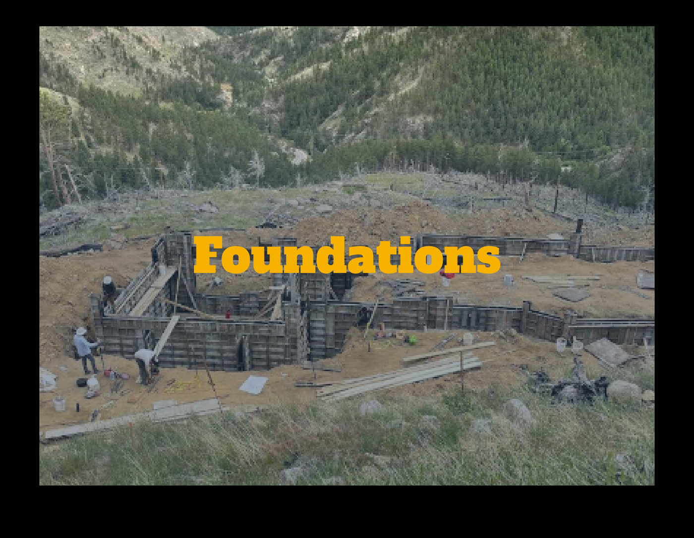 Concrete foundation for a building in the mountains
