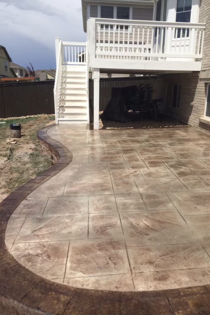 Multi-colored stamped backyard patio