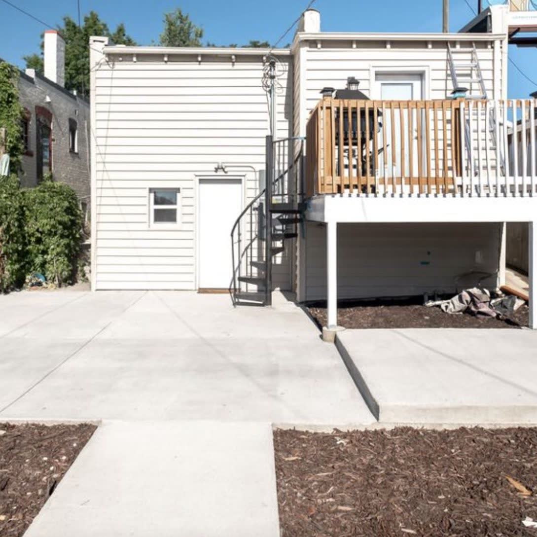 Covered backyard concrete patio