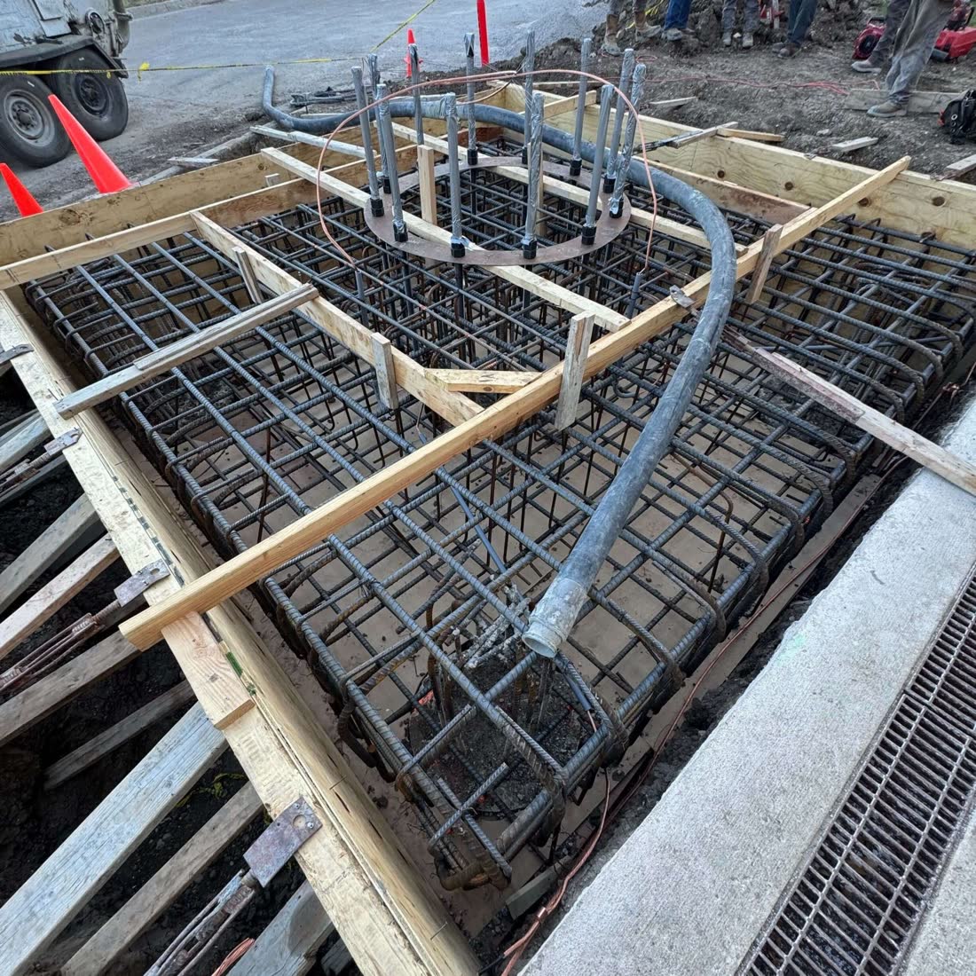 Rebar cage set in wood forms for a custom commercial foundation