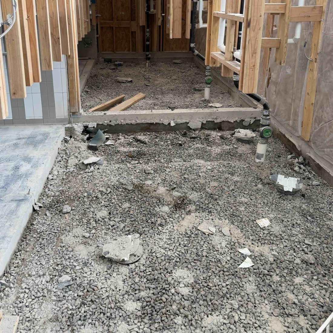 Old concrete slab broken out and removed
